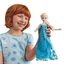 Load image into Gallery viewer, elsa-classic-doll-with-ring-fully-poseable-and-stickers.jpg
